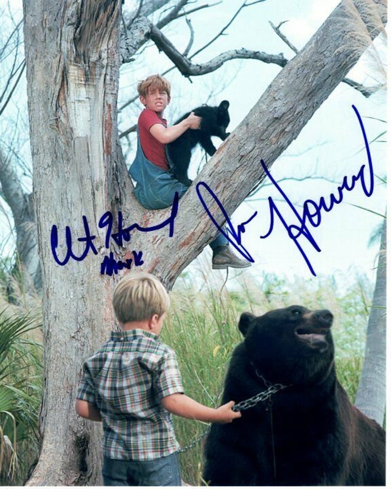 Ron howard and clint howard signed autographed gentle ben jerry & mark Photo Poster painting