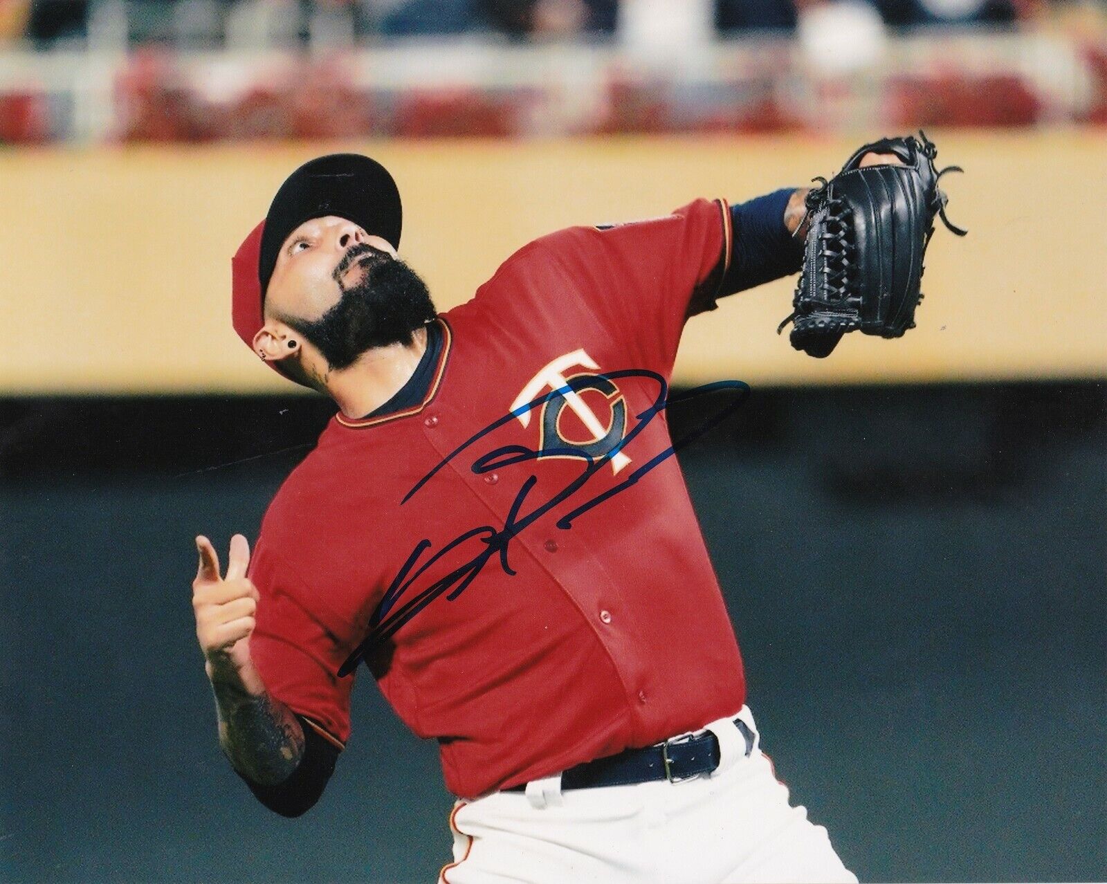 SERGIO ROMO MINNESOTA TWINS ACTION SIGNED 8x10