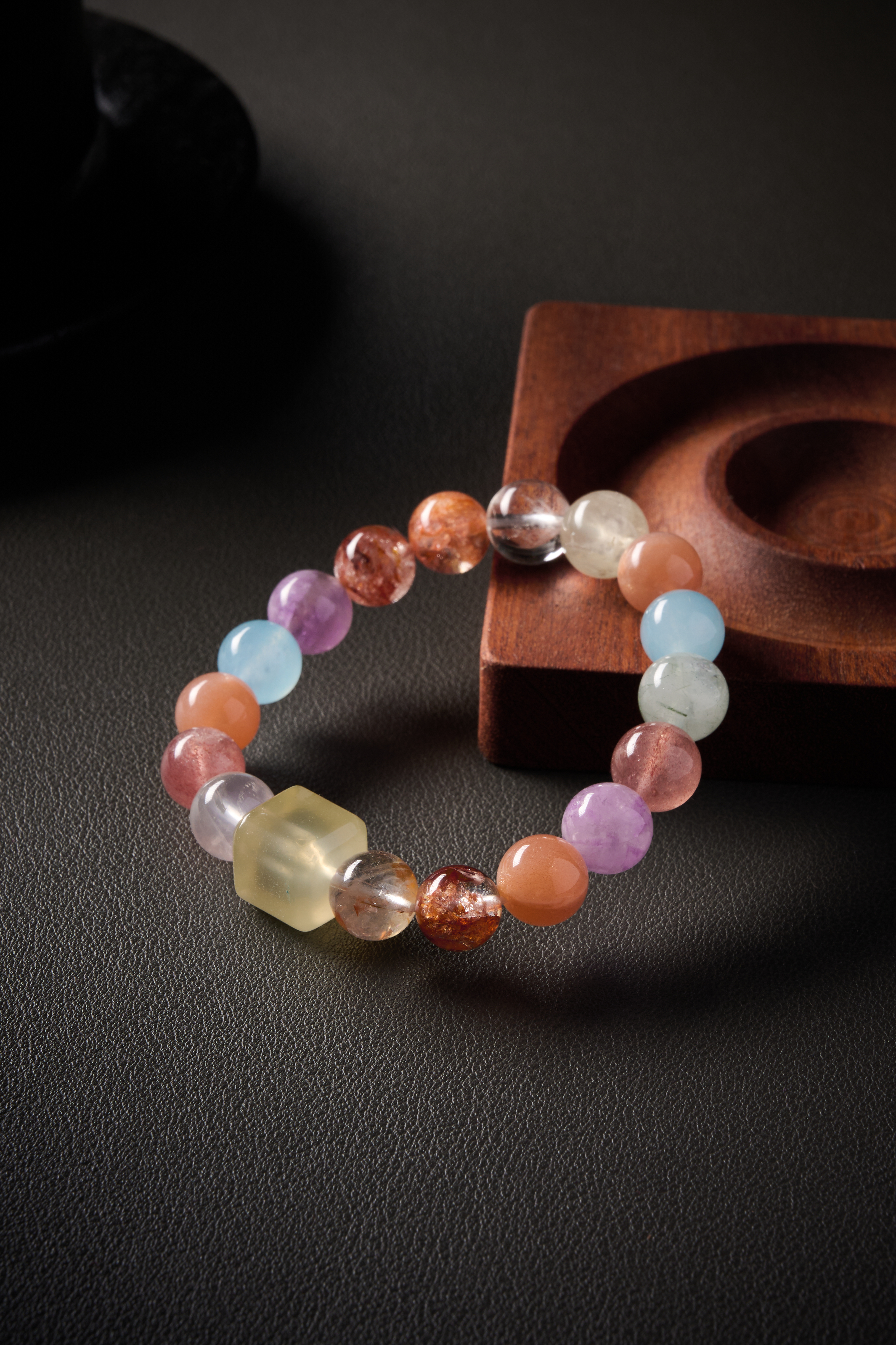 Close-up – amethyst purple bead, even color and glossy finish, natural gemstone texture visible.