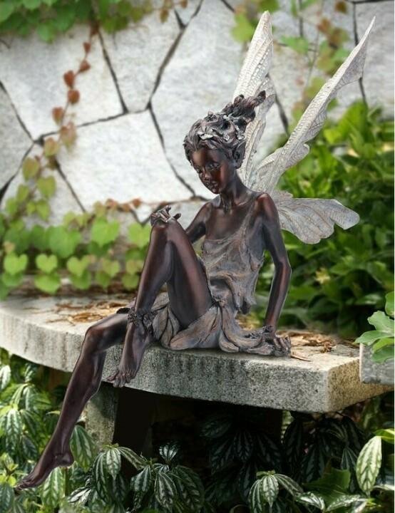 tudor and turek sitting fairy statue