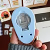 Stamp embossing tool, journal material collector, cutter