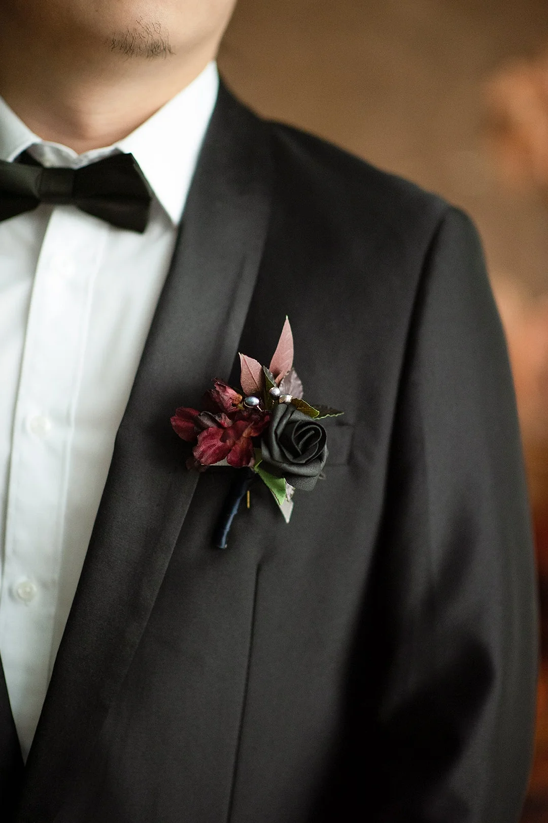 DIY Wedding Boutonnieres in Black & Pumpkin Orange