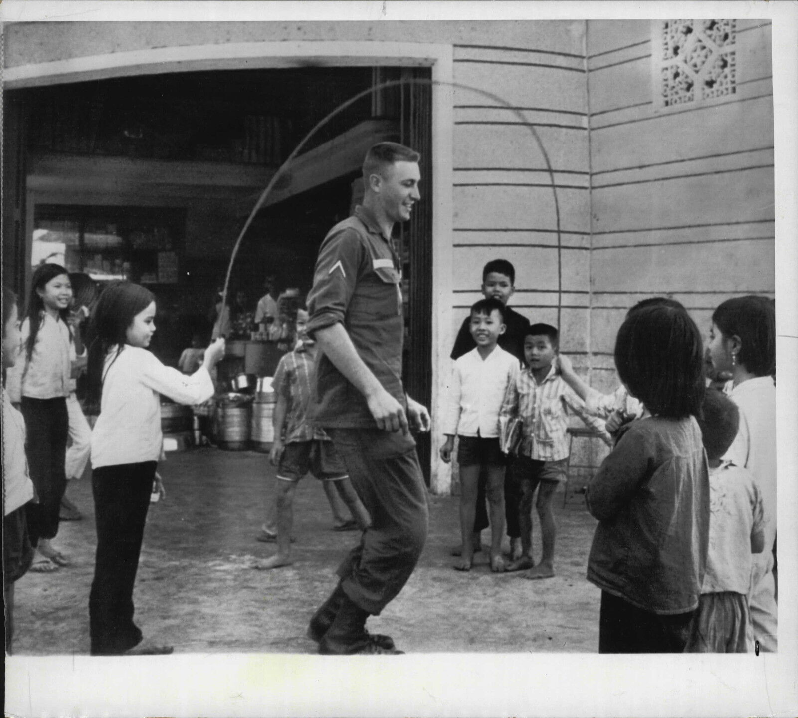 1966 US Army Air Cav Soldier Skips Rope in South Vietnam Press Photo Poster painting