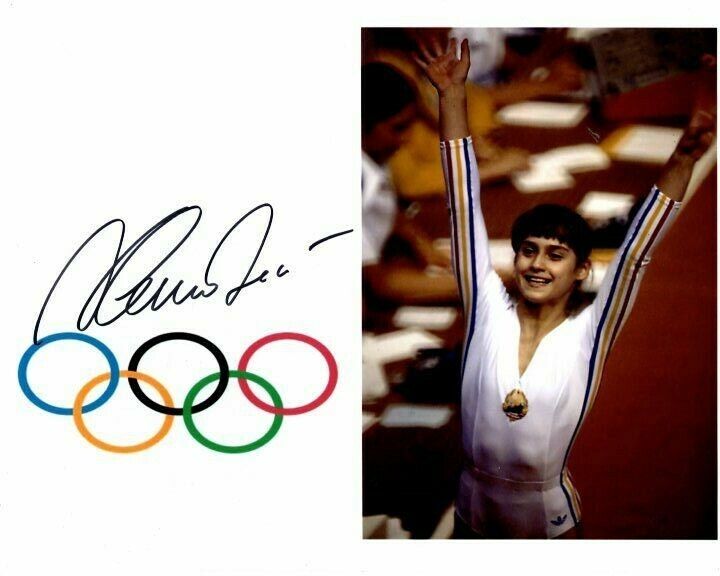 NADIA COMANECI Signed Autographed OLYMPIC GYMNAST Photo Poster painting