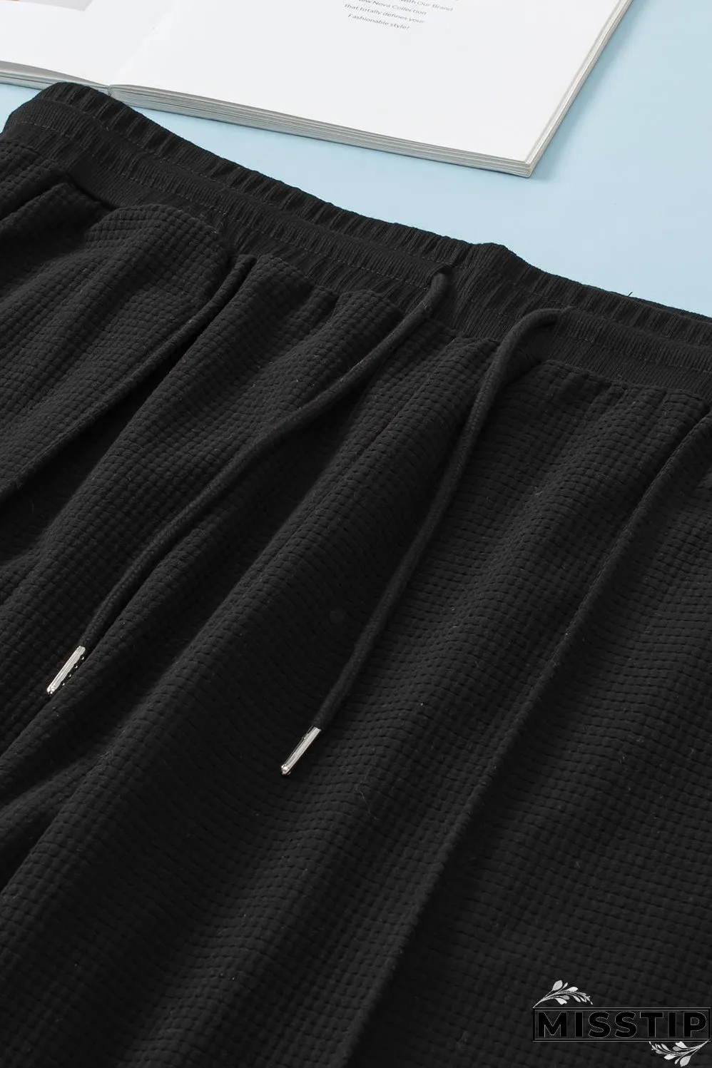 Black Plus Size Textured Exposed Seam Drawstring Jogger Pants