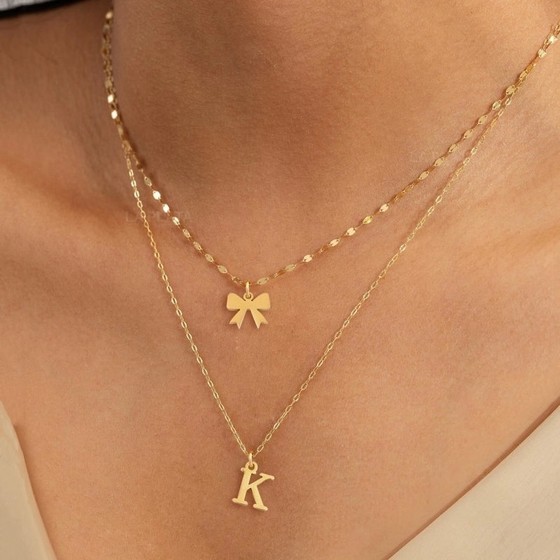 Elegant Minimalist Classic Style Letter Bow Knot 201 Stainless Steel 304 Stainless Steel Pendant Necklace