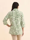 Back view of modern architectural print summer blouse showing relaxed fit and high-quality linen-blend texture
