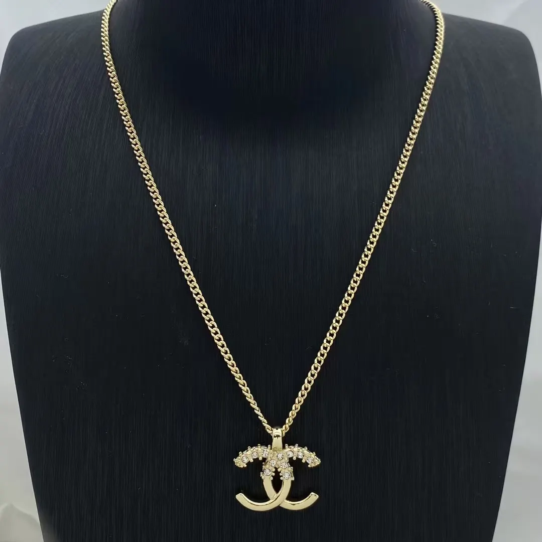 Chanel Coco Pendant Minimalistic Gold Necklace