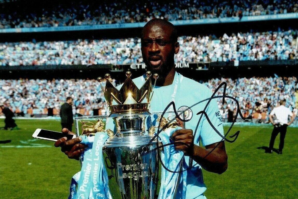 Yaya Toure Signed 12X8 Photo Poster painting Manchester City Genuine Signature AFTAL COA (1532)