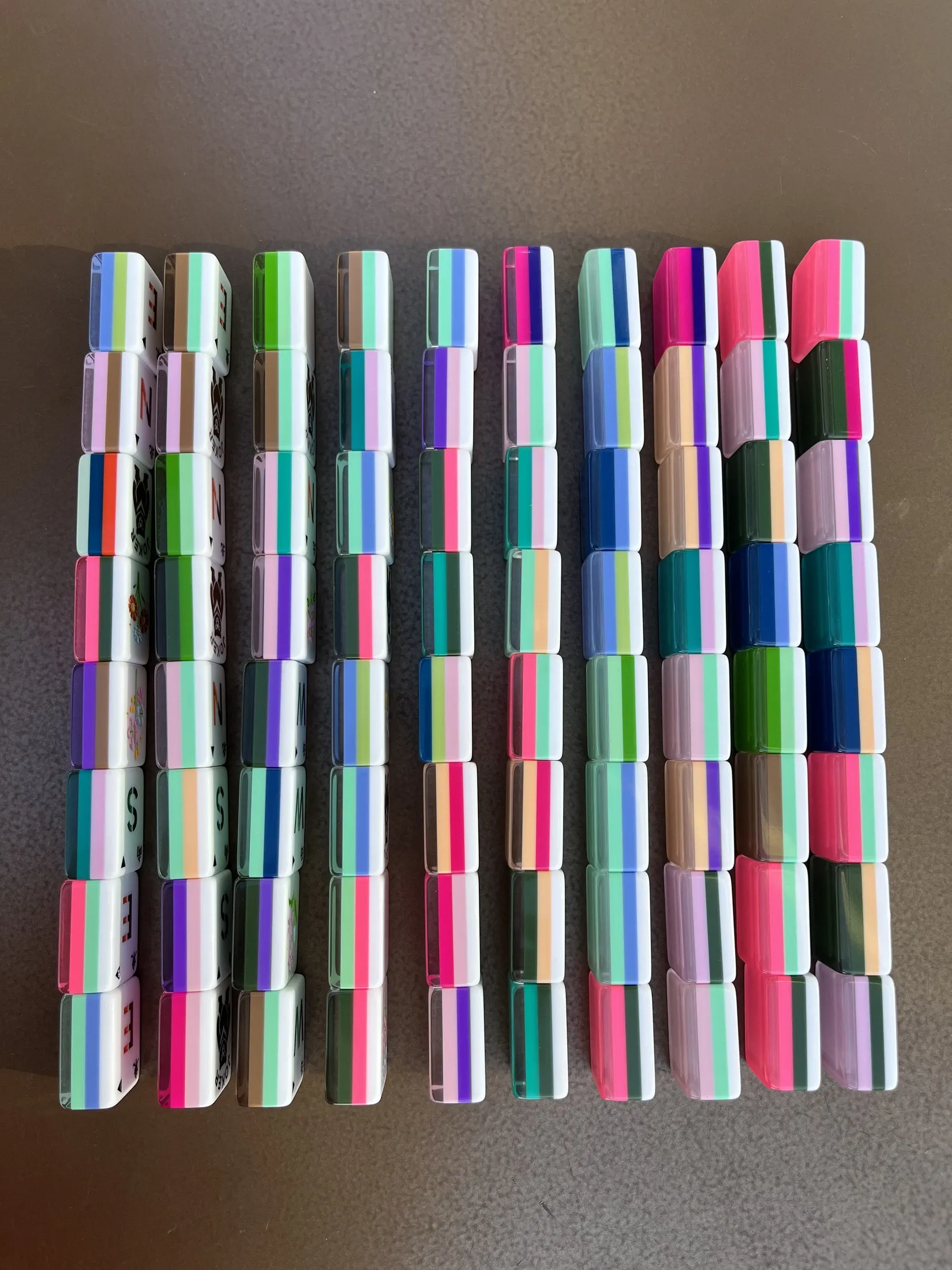 A complete set gathered to show faces and solid backs together.