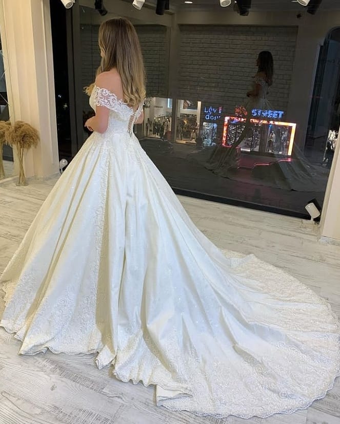 Off-the-Shoulder Chiffon A-Line Wedding Gown with Flowing Train