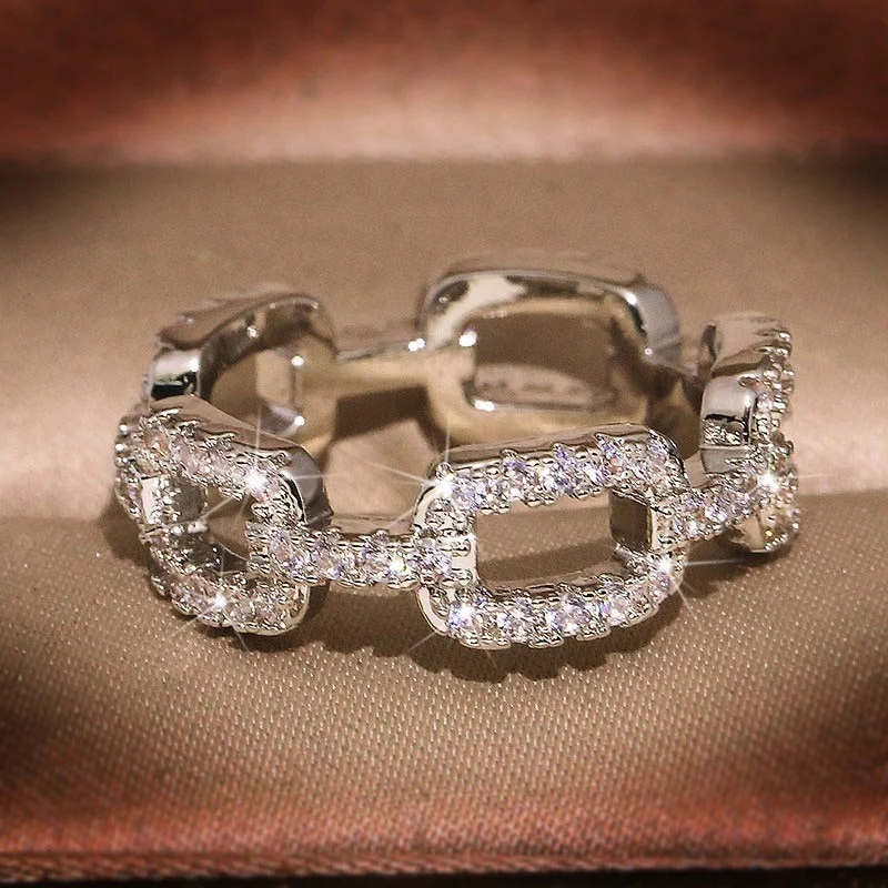 Sparkling Zircon Adorned Hollow Link Chain Shape Rings