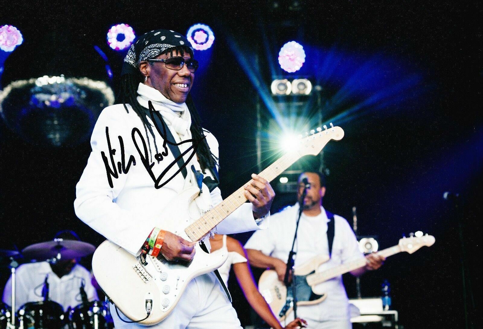 Nile Rodgers SIGNED 12X8 Photo Poster painting AFTAL COA (A2)