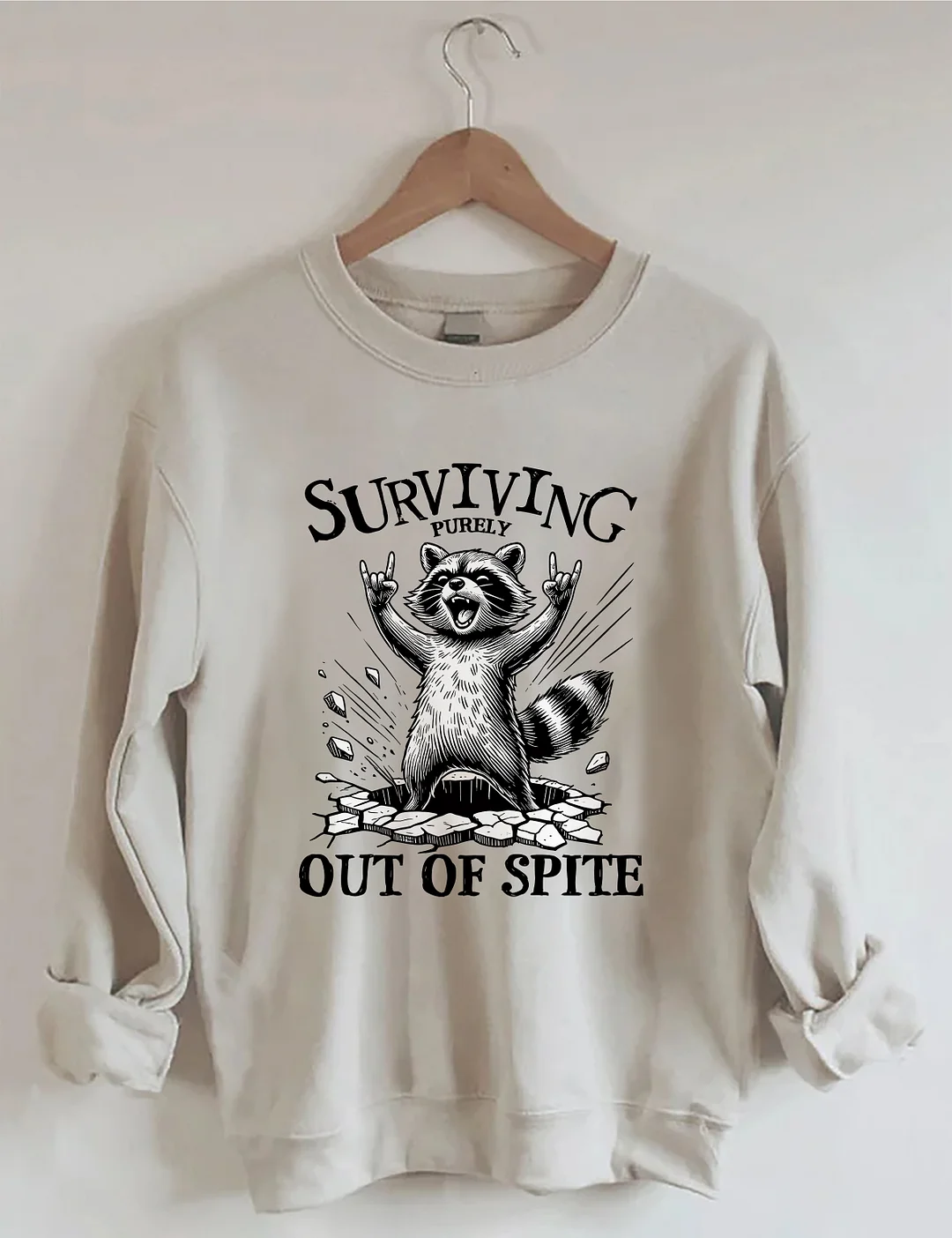 Surviving Purely Out Of Spite Raccoon Sweatshirt