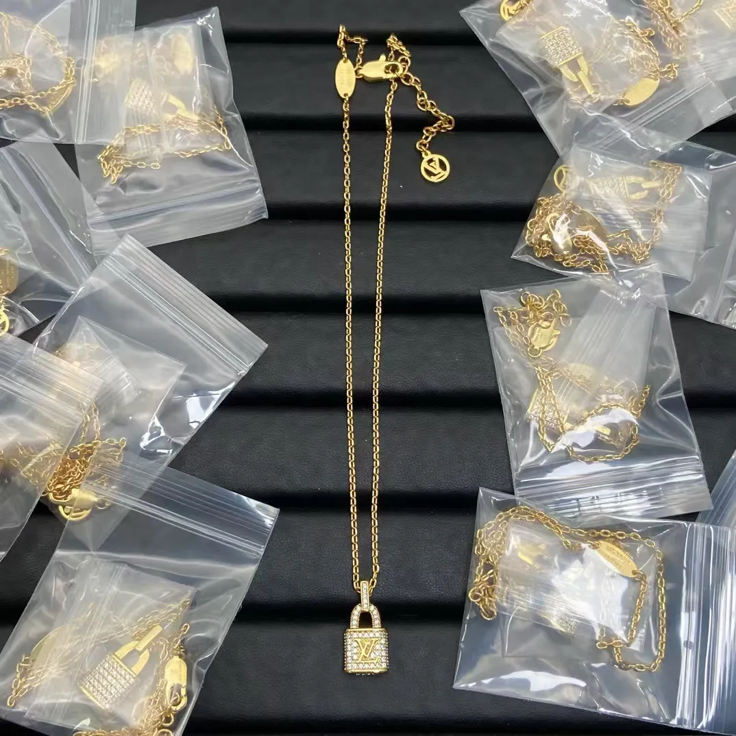 Louis Vuitton Diamond Lock Pendant Necklace Earrings