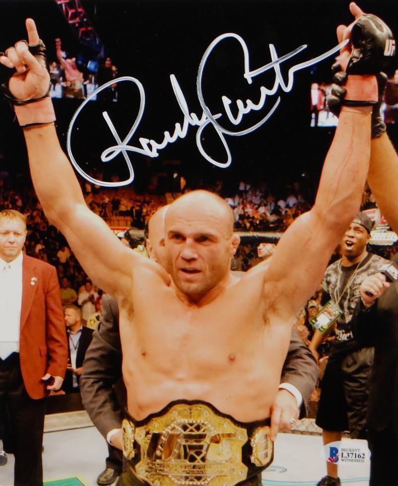 Randy Couture Autographed UFC 8x10 Photo Poster painting With Belt- Beckett Auth *White