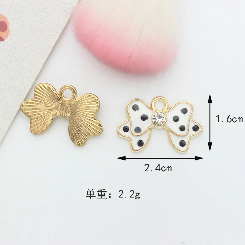 10 PCS/Package 1.5 * 20mm 14 * 14mm 7 * 12mm Alloy Rhinestones Pearl Number Heart Shape Bow Knot Polished Pendant