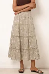 Front view of women's linen-blend floral tiered maxi skirt with intricate lace inserts and flat waistband