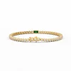 14K Yellow Gold Round Lab Diamond Bezel Setting Tennis Bracelet with A Baguette Cut Lab Emerald  Center Stone