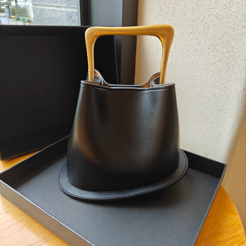 High-grade Retro Genuine Leather Bucket Bag With Wooden Handle New Irregular Niche Design Bag Casual All-matching