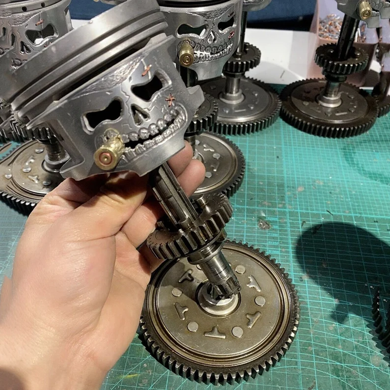 Piston Skull Face Sculpture