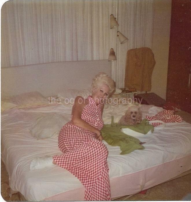 A Lady On Her Bed With Her Dog. Both Have White Hair. COLOR FOUND Photo Poster painting 04 21 K