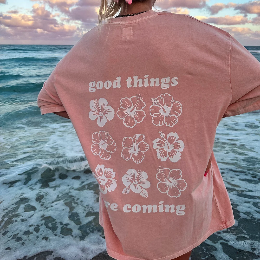 GOOD THINGS ARE COMING FLOWER TEE