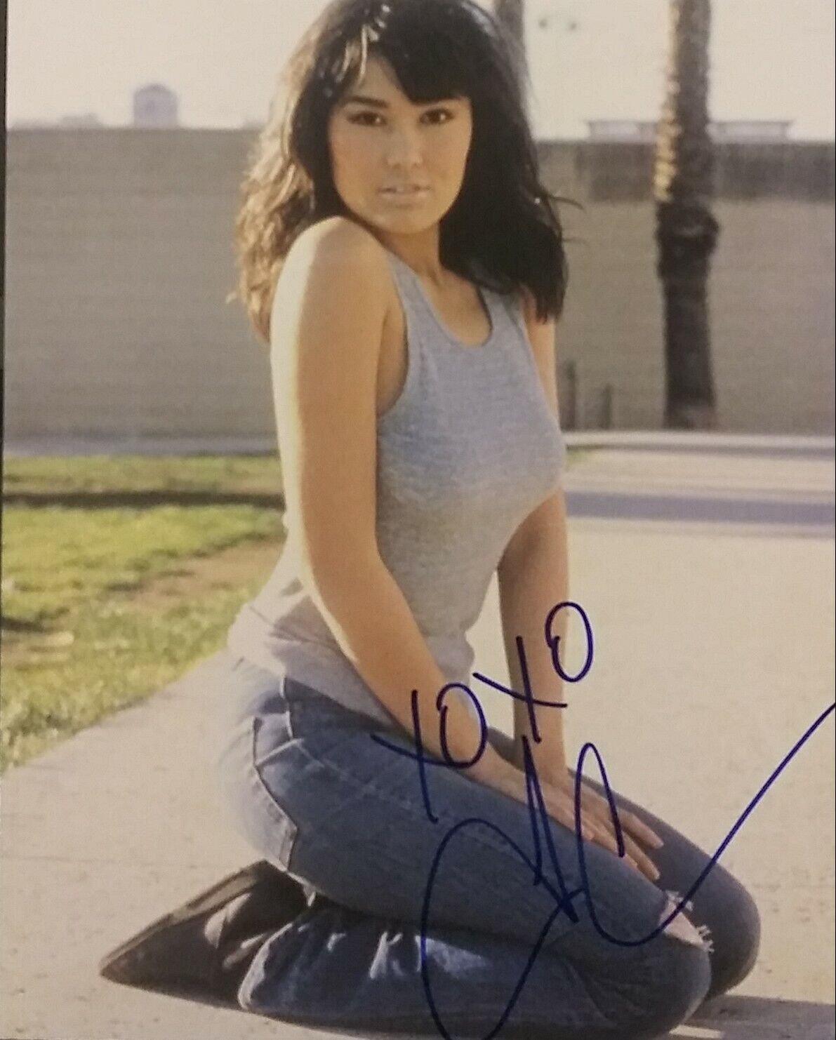 Tia Carrere signed 8 x 10