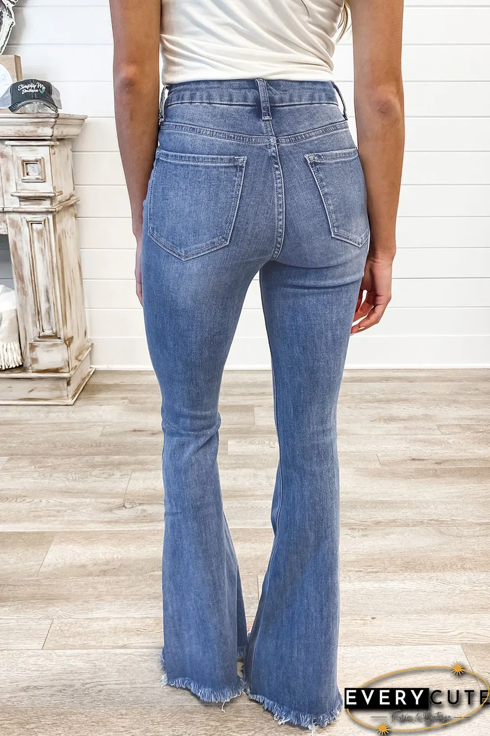 Medium Washed High Waist Flare Jeans with Raw Edges