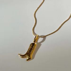 Golden little boots necklace
