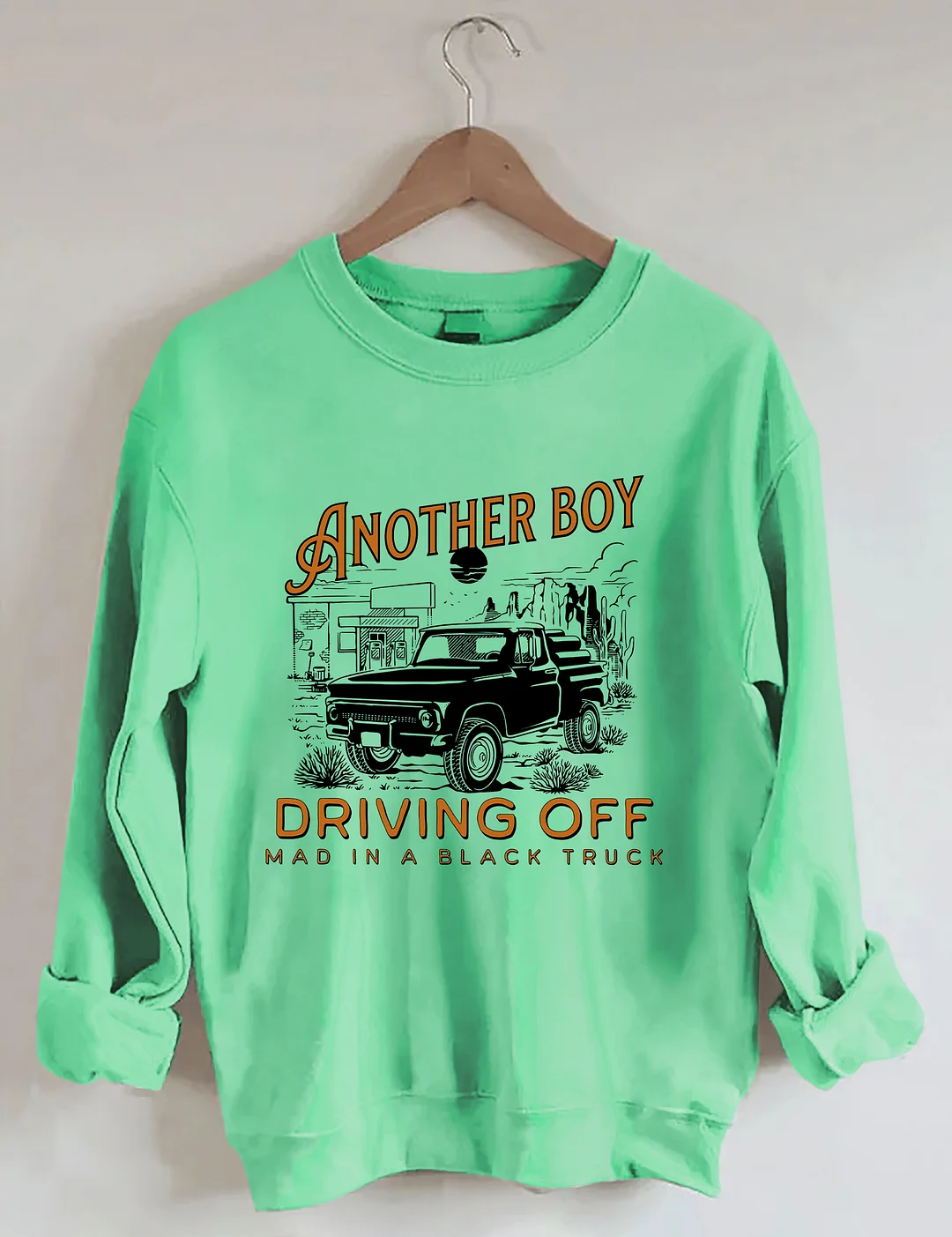 Boy Driving Off Mad Black Truck Sweatshirt