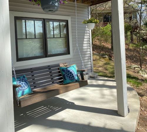 Timeless Charm of a Wood Frame Porch Swing