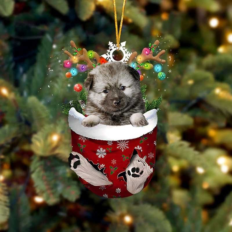 Keeshond In Snow Pocket Christmas Ornament.