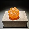 Hand-carved orange shape from pure natural jade - a collectible item