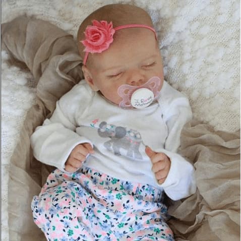 What is a reborn baby doll? - Quora
