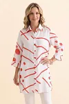 Front view of a woman wearing an olive green abstract print longline linen-blend shirt with buttons