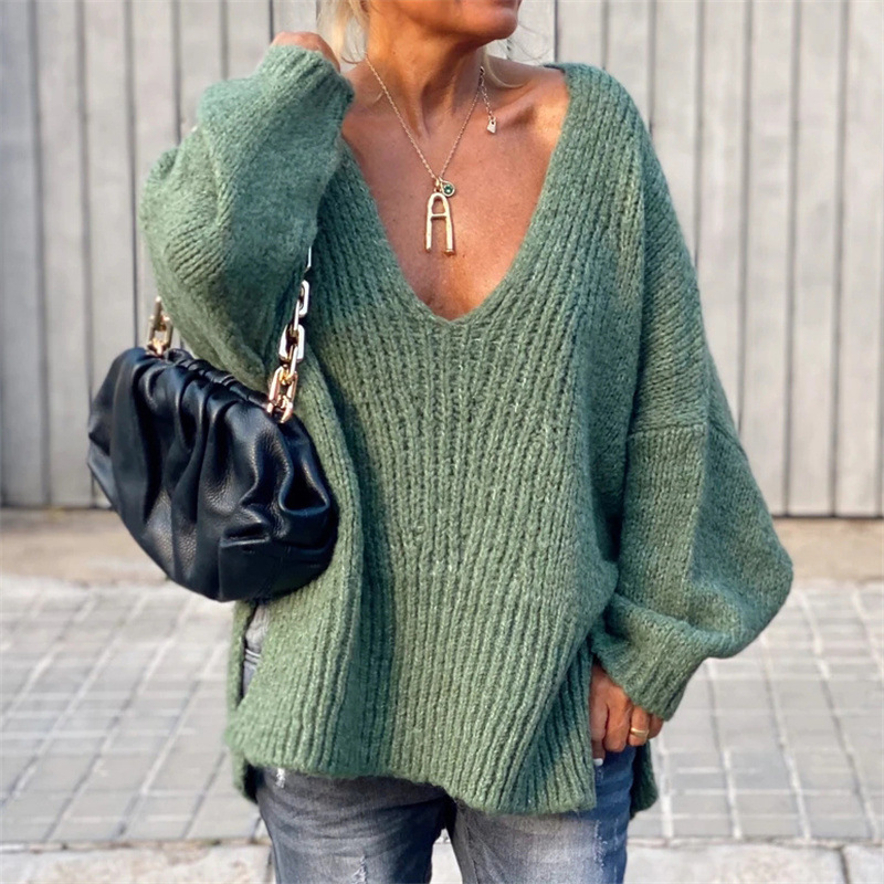V-neck knitted sweater with side slits