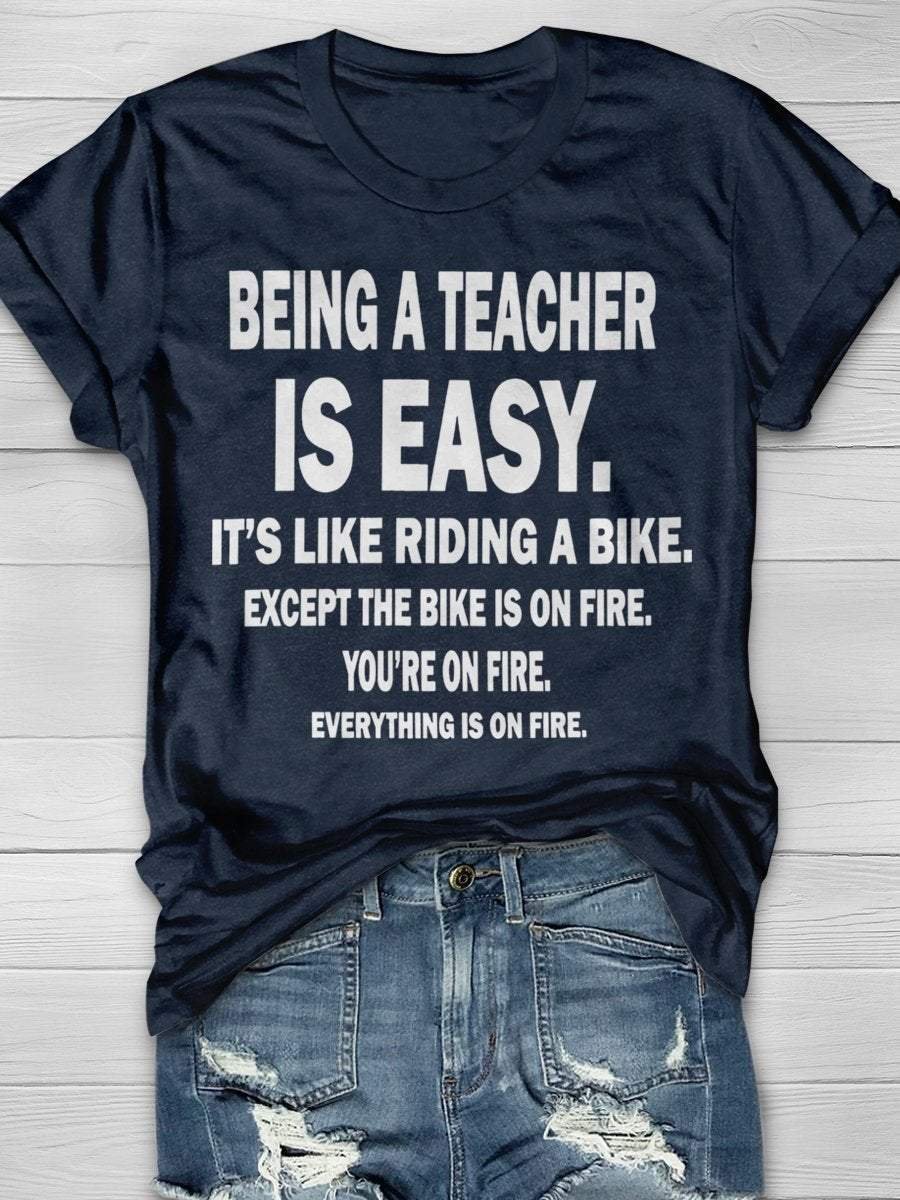 Being A Teacher Is Easy It's Like Riding A Bike Except The Bike Is On Fire Everything Is On Fire Print Short Sleeve T-shirt