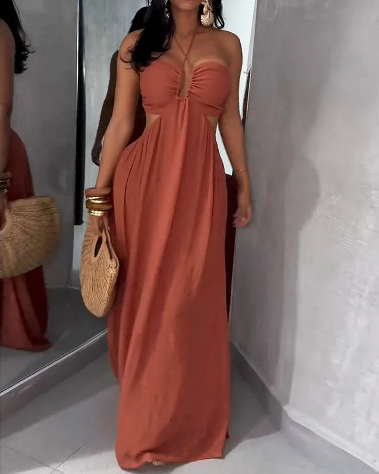 Sleeveless solid color hollow dress