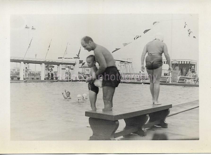 1940'S Boy FOUND Photo Poster painting bw LEARNING TO SWING WHIT GRANDPA AT THE POOL JD 110 1 A