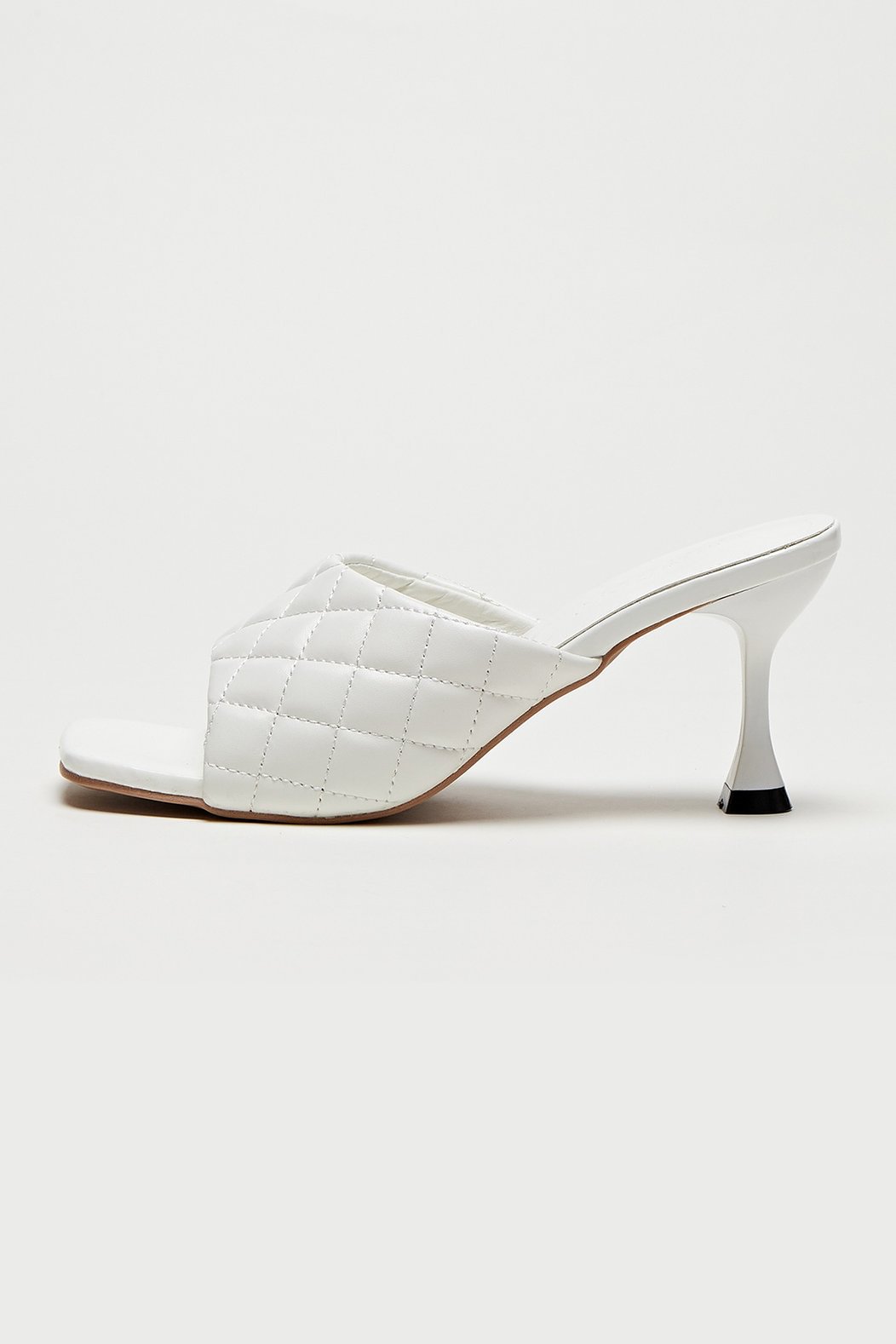 white quilted heeled mules