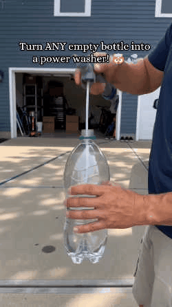 Manual pressure sprayer nozzle attached to a reusable plastic bottle