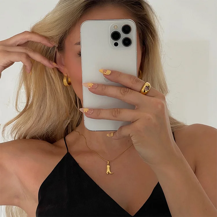 Golden little boots necklace