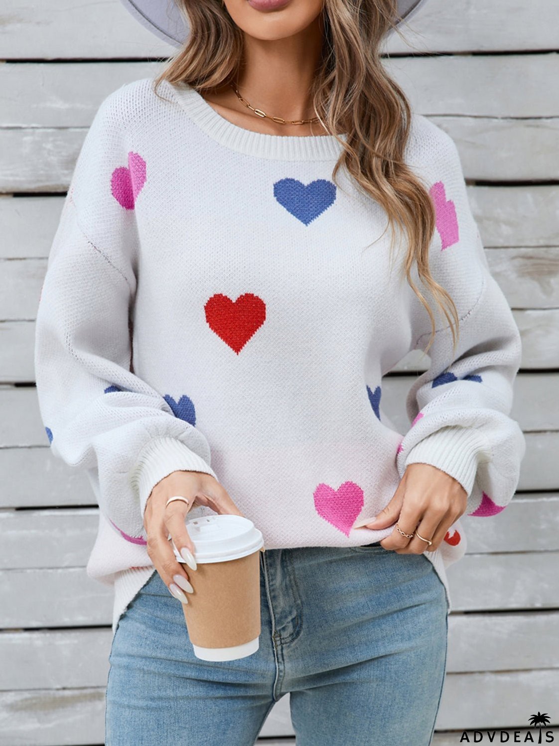 Heart-shaped, long-sleeved crew neck sweater