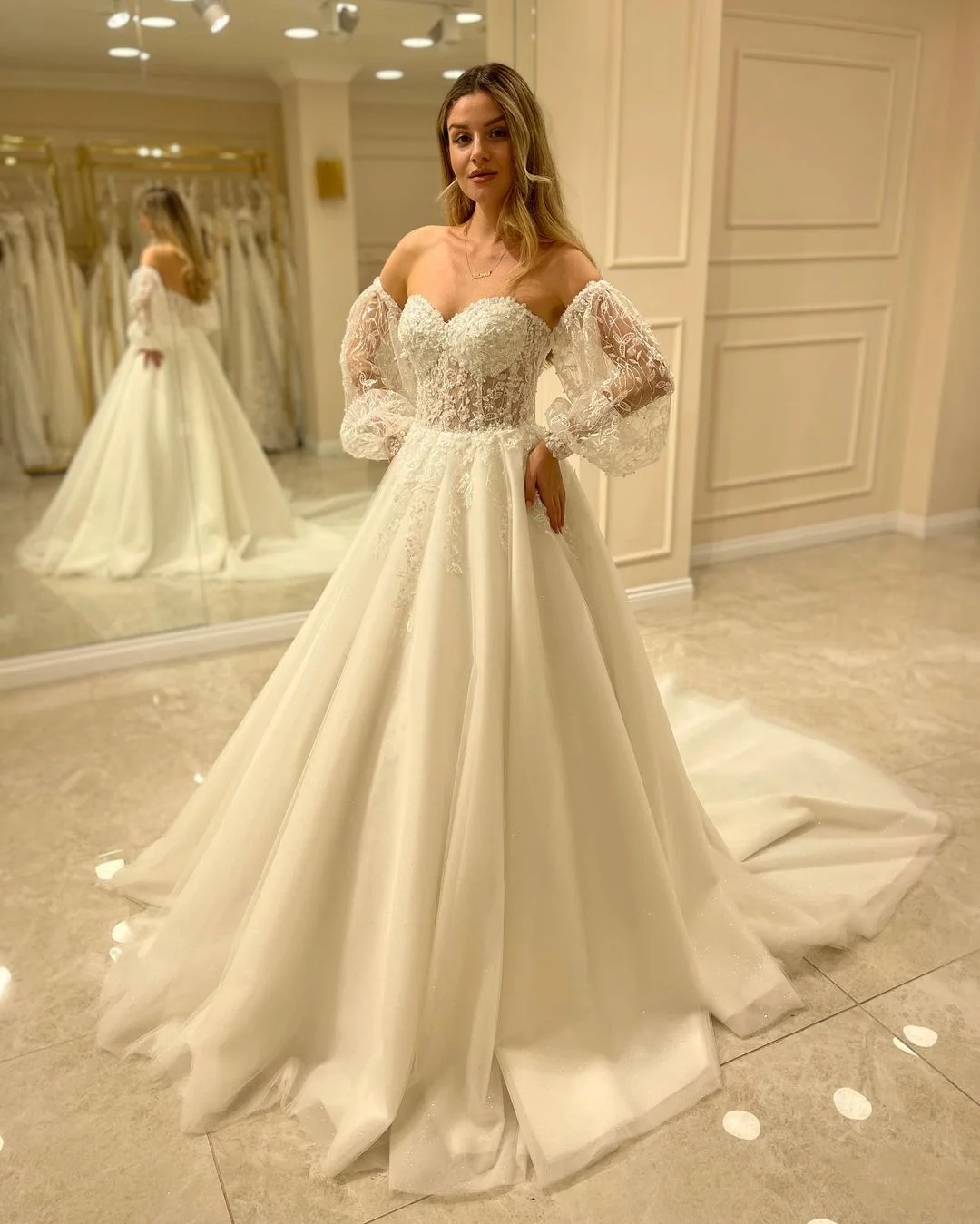 Miabel Glamorous Backless Sweetheart Long Sleeve Train Wedding Dress With Appliques Lace A-Line