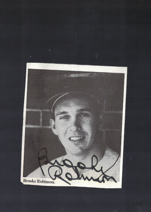 Brooks Robinson Baltimore Orioles Signed Cut From Book Picture W/Our COA