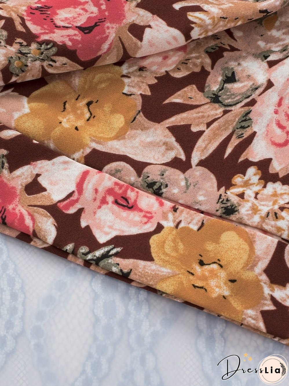 Short Sleeve Floral Blouse with Bubble Hem