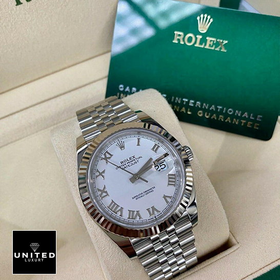 Rolex Datejust Roman 126334 White Dial Replica in the rolex box and warranty card next to