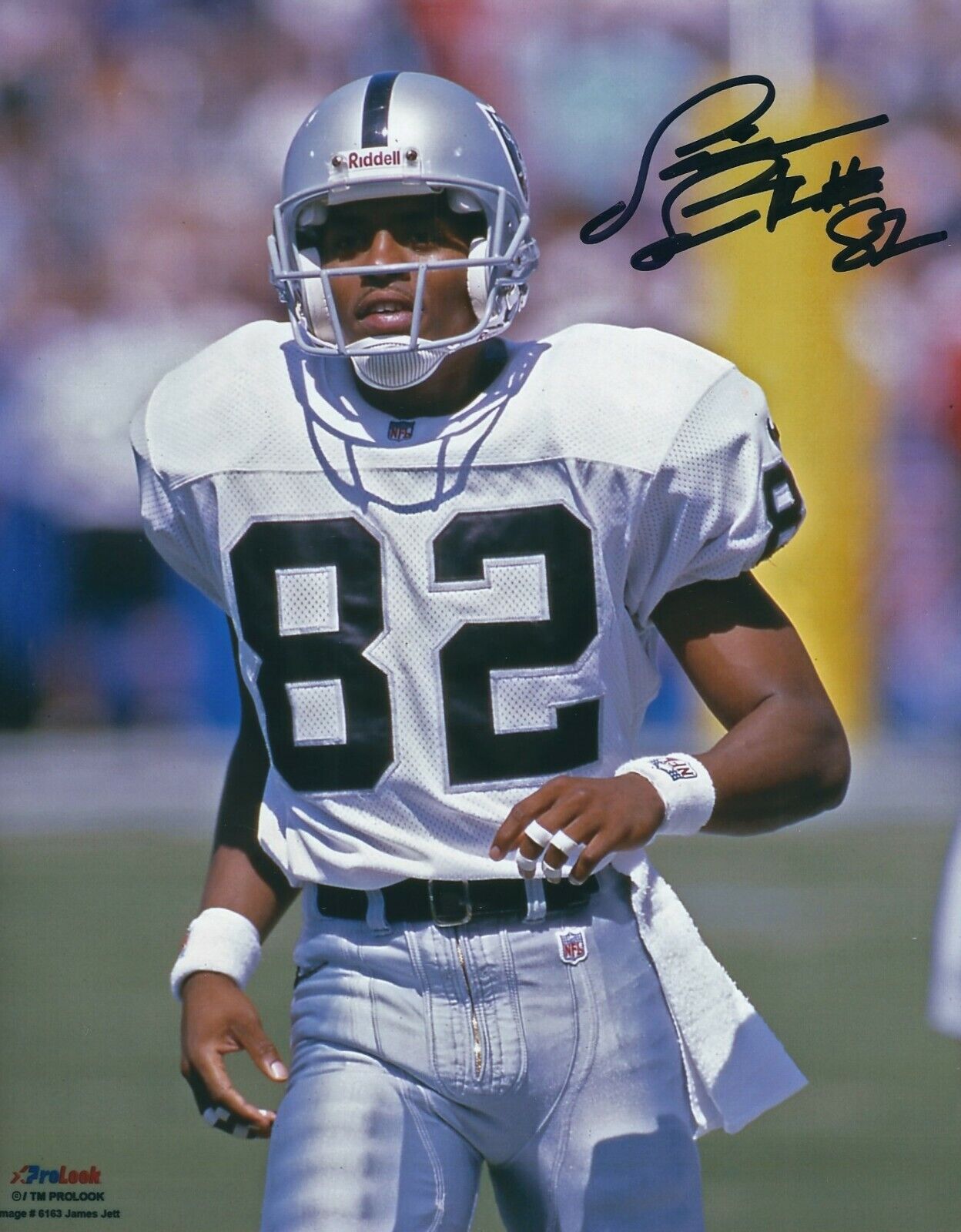 Autographed JAMES JETT Oakland Raiders 8x10 Photo Poster painting w/COA