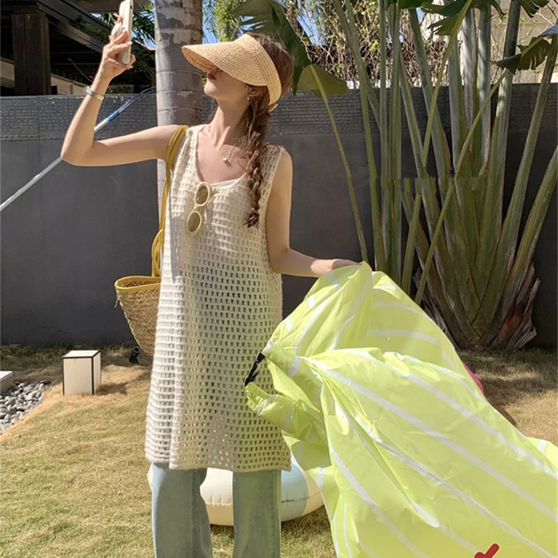 Ueong Ueong Spring And Summer Temperament Pure Color In The Long Knit Skirt Early Spring Small Design Sense Hollow Out Fold Wear Vest Dress Female